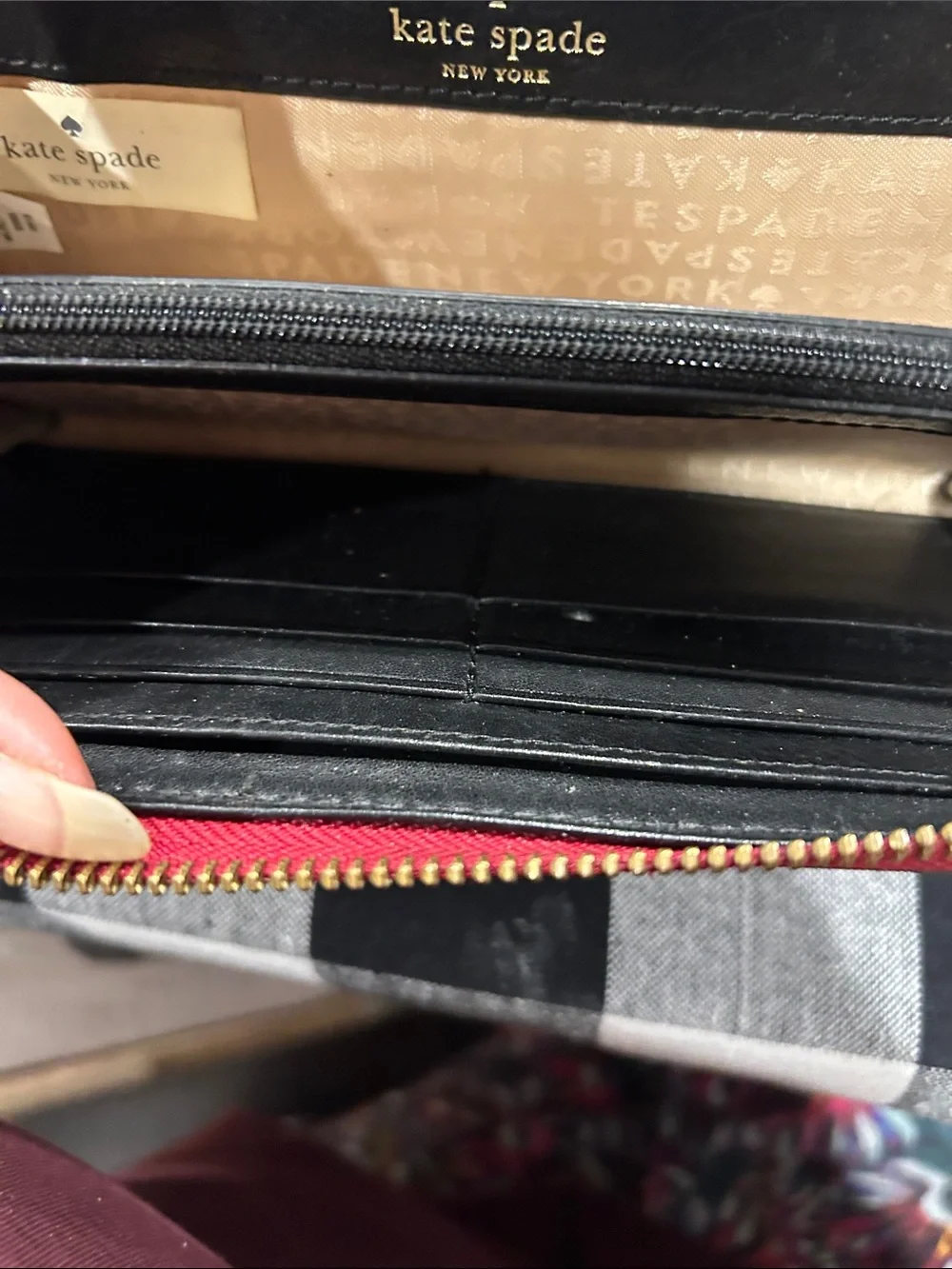 Kate Spade glossy red patent zip wallet with gold plaque